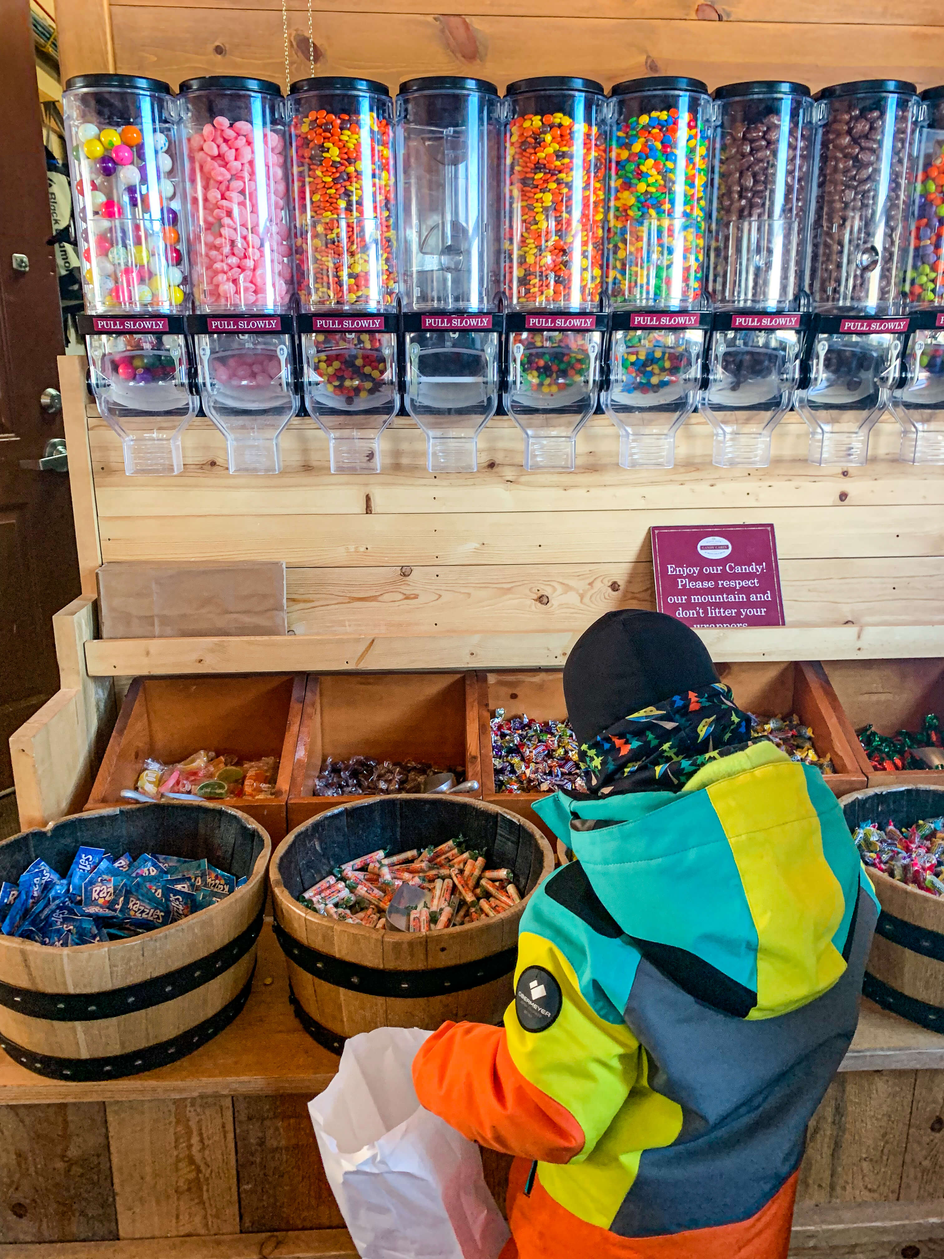 Child picking out candy at Candy Cabin in Beaver Creek